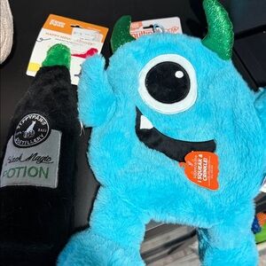 Blue Monster Plush Toy with Black Potion Bottle. NWT. Dog toys for Halloween